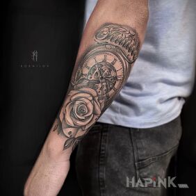 Tattoo Rouse on the forearm motif: black and gray style: realistic