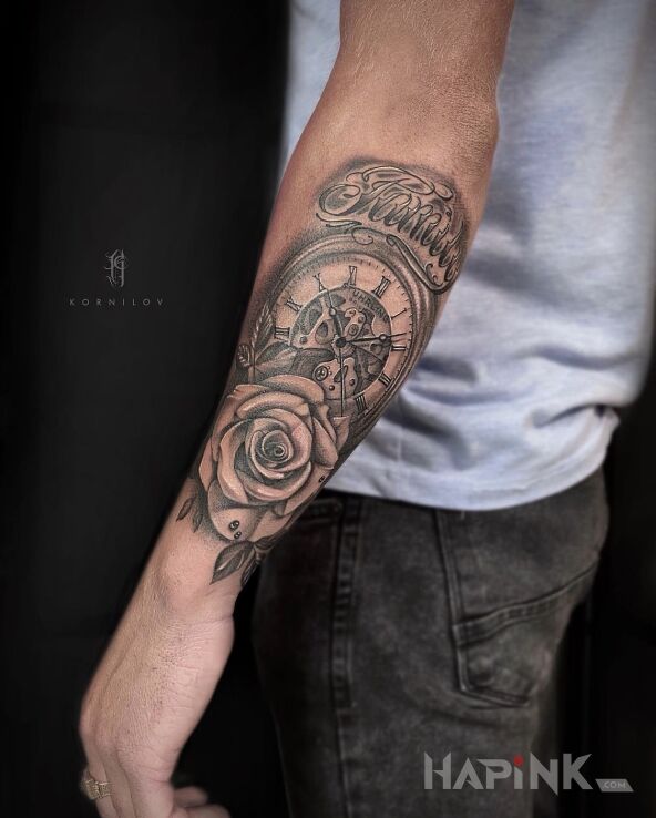Tattoo Rouse in objects motif and realistic style On the arm