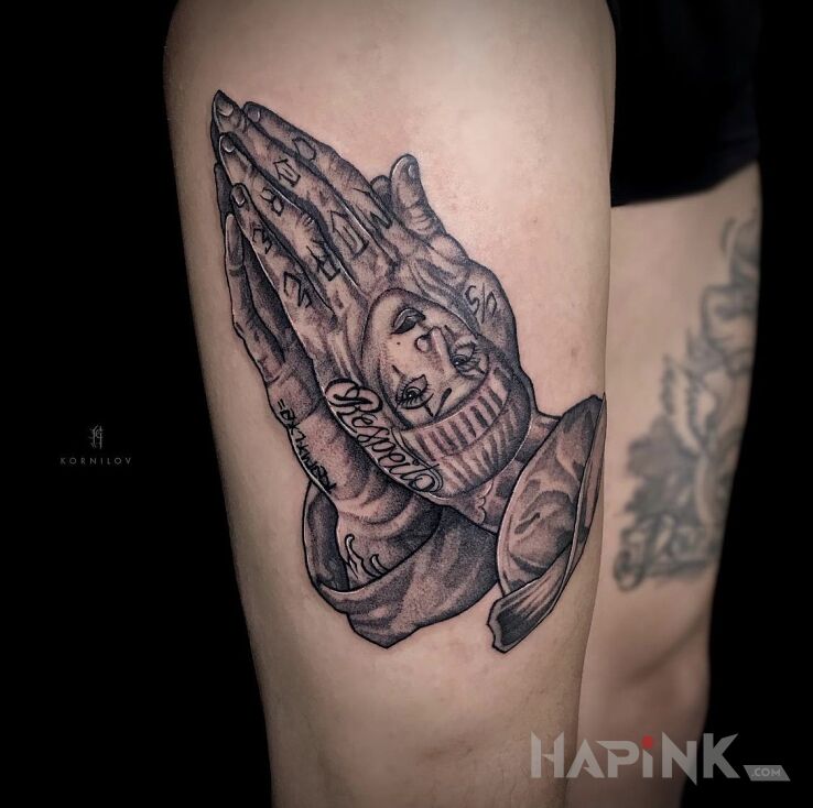 Tattoo Crime art in faces motif and chicano style on the leg