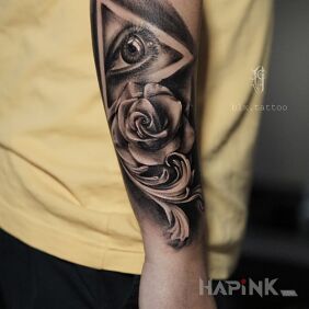 Tattoo Eye On the arm motif: flowers style: realistic