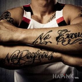 Tattoo No excuses on the forearm motif: lettering