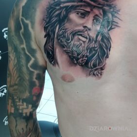 Tatuaż Tattoo Jezus na klatce motyw: religijne styl: realistyczne