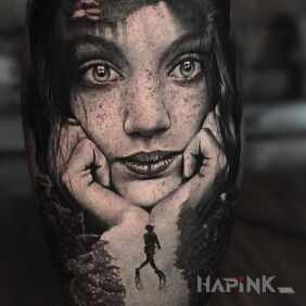 Tattoo Diver on the calf motif: faces style: realistic