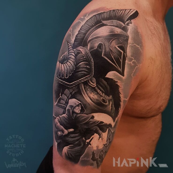 Tattoo Wojownik in war motif and realistic style on the upper arm