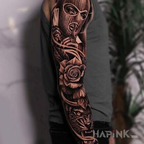 Tattoo Girl in a balaclava On the arm motif: black and gray style: realistic