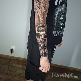 Tattoo Demon, skull on the forearm motif: black and gray style: realistic