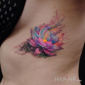 Tattoo Lotus flower on the ribs motif: flowers
