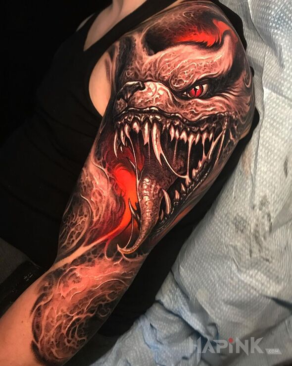 Tattoo Gęba bestii in animals motif and realistic style on the upper arm