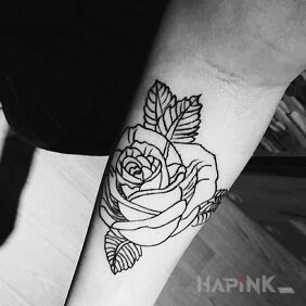 Tattoo Rose on the forearm motif: flowers