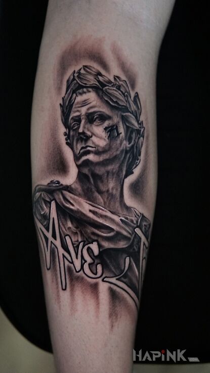 Tattoo Cesar in characters motif and graphic / illustrative style on the forearm