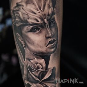 Tattoo Viking girl on the forearm motif: flowers style: realistic