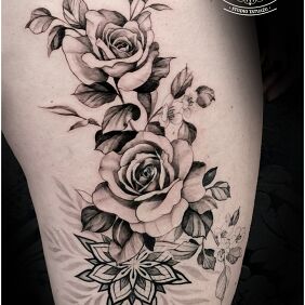 Tattoo Flowers on the thigh motif: mandalas style: realistic