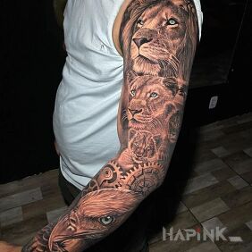 Tattoo A pride of lions and an eagle On the arm motif: black and gray style: realistic