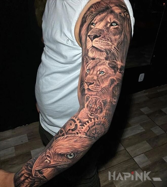 Tattoo Gromadka lwów i orzeł in black and gray motif and realistic style on the upper arm