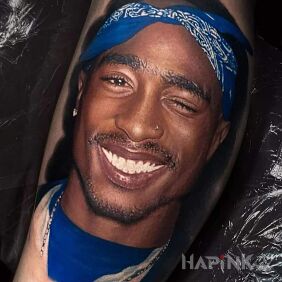 Tattoo Insane portrait of Tupac On the arm motif: colorful style: realistic