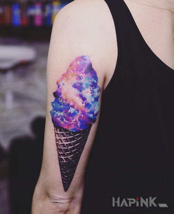 Tattoo Lody z kosmosu in cosmos motif on the upper arm