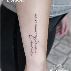 Tattoo Inscription On the arm motif: lettering style: calligraphy