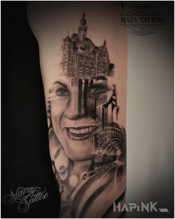 Tattoo Silesia in black and gray motif and realistic style on the upper arm