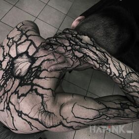 Tattoo Struck by lightning on the back motif: other style: blackwork / blackout