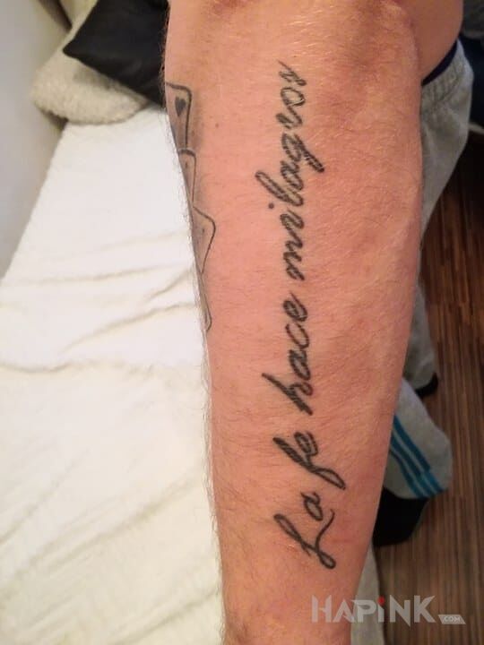 Tattoo Napis in lettering motif on the forearm