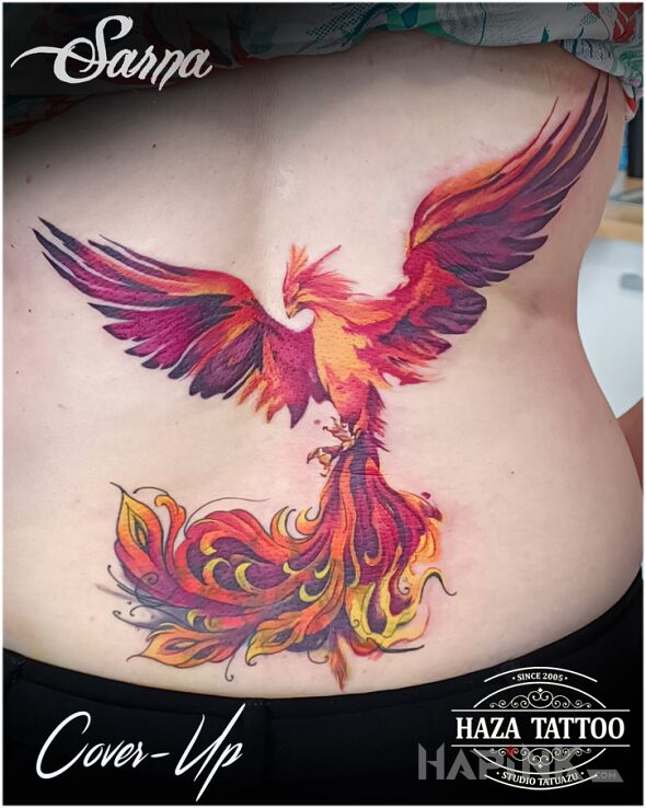 Tattoo Cover done with a phoenix in colorful motif and graphic / illustrative style on the back