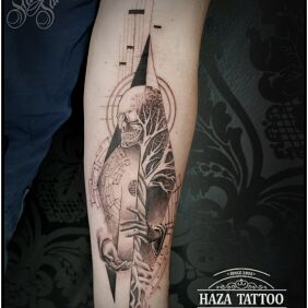 Tattoo Abstraction on the forearm motif: skulls style: graphic / illustrative