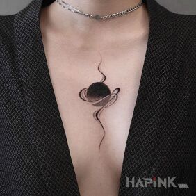 Tattoo Black sphere on the chest motif: other style: dotwork