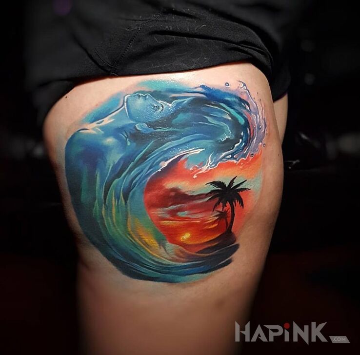 Tattoo Kobieta na fali in characters motif on the leg