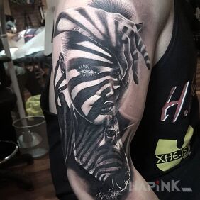 Tattoo Zebra on the upper arm motif: animals