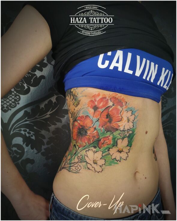 Tattoo Poppy flowers in colorful motif and graphic / illustrative style on the ribs