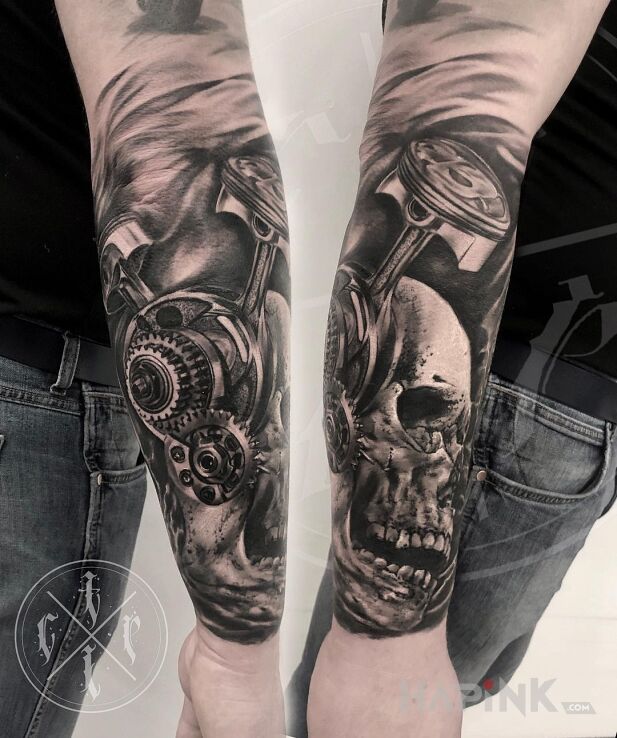Tattoo Abstrakcja motoryzacyjna in black and gray motif and realistic style on the forearm