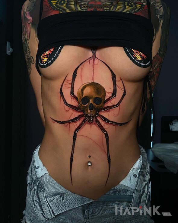 Tattoo Śmiercionośny pająk in colorful motif and realistic style underboob