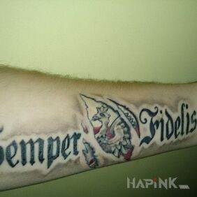 Tattoo Semper Fidelis on the forearm motif: patriotic