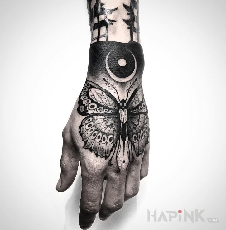 Tattoo Motyl in butterflies motif on the hand