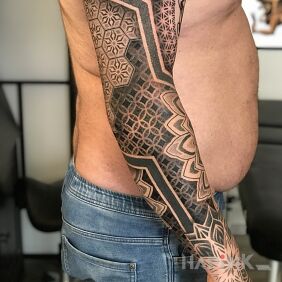 Tattoo Ornamental Style Tattoo On the arm motif: mandalas style: geometric