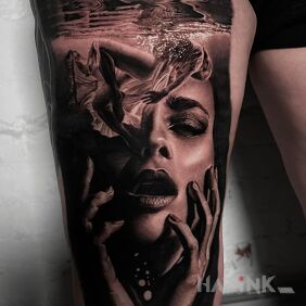 Tattoo Girl under water on the thigh motif: 3D style: realistic