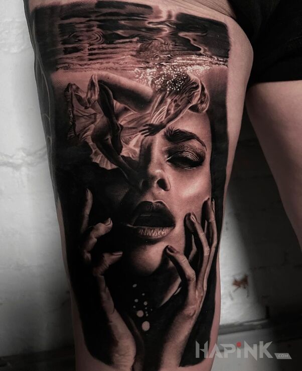 Tattoo Dziewczyna pod wodą in black and gray motif and realistic style on the thigh