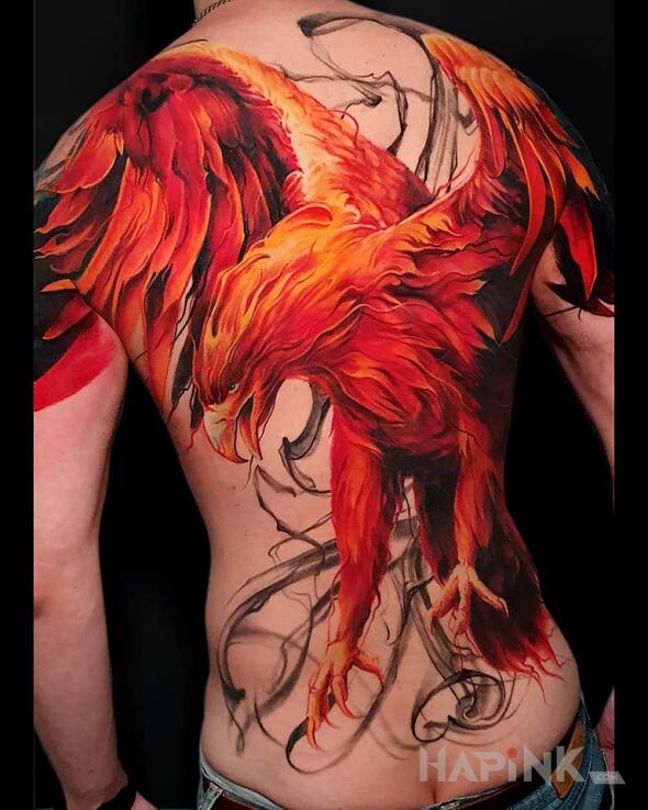 Tattoo Dark fenix rises in colorful motif and realistic style on the back