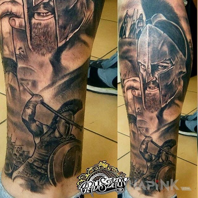 Tattoo Spartanie in other motif and realistic style on the calf