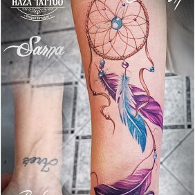 Tattoo Cover dreamcatcher On the arm motif: colorful style: realistic