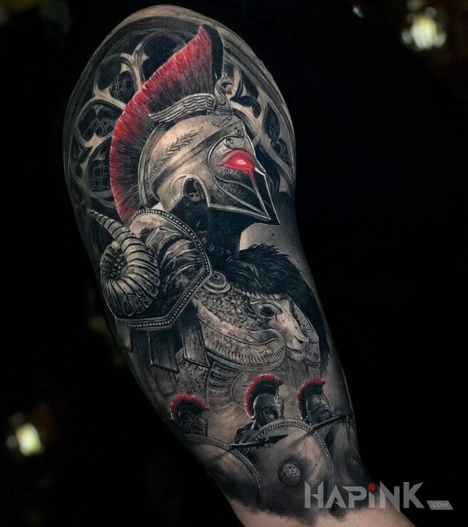 Tattoo Czerwonooki wojak in war motif and realistic style on the upper arm