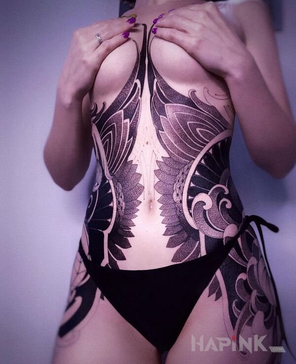 Tattoo Uskrzydlona in black and gray motif and dotwork style on the ribs