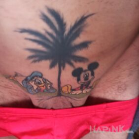 Tattoo My Mickey Mouse under a palm tree intimate motif: characters style: cartoon / comic book