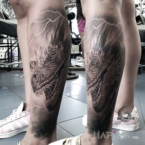 Tattoo Game of Thrones - DROGON on the leg motif: dragons style: realistic