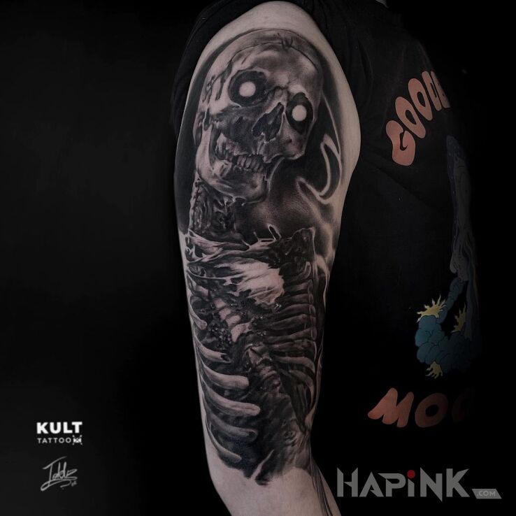 Tattoo KOŚCIOTRUP in demons motif and realistic style On the arm