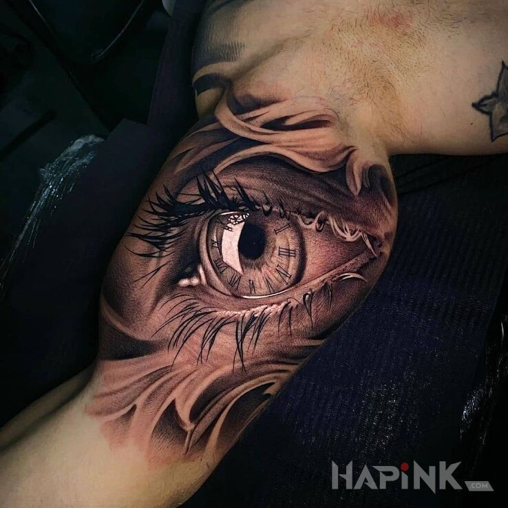Tattoo Damskie oko in black and gray motif and realistic style on the bicep