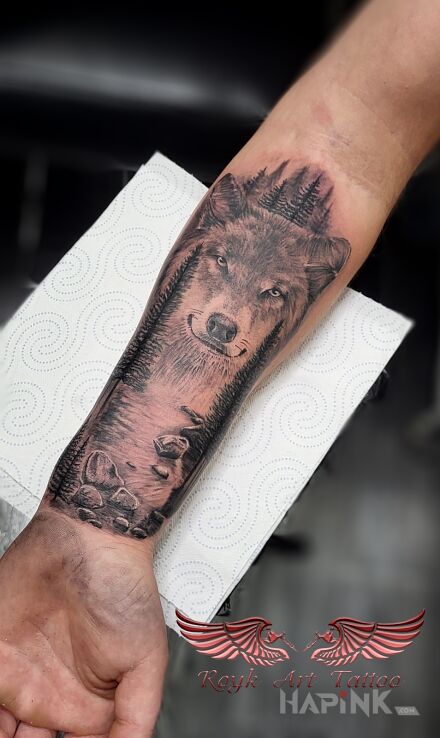 Tattoo Wilk in animals motif and realistic style on the forearm