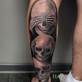 Tattoo Skulls On the arm motif: dark style: realistic