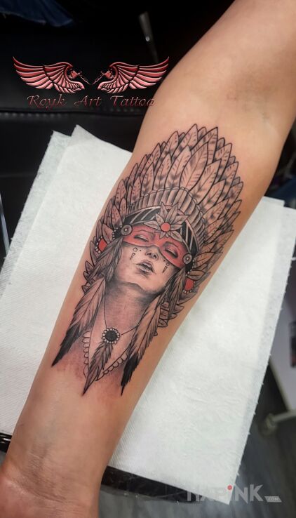 Tattoo Indianka in black and gray motif and realistic style On the arm