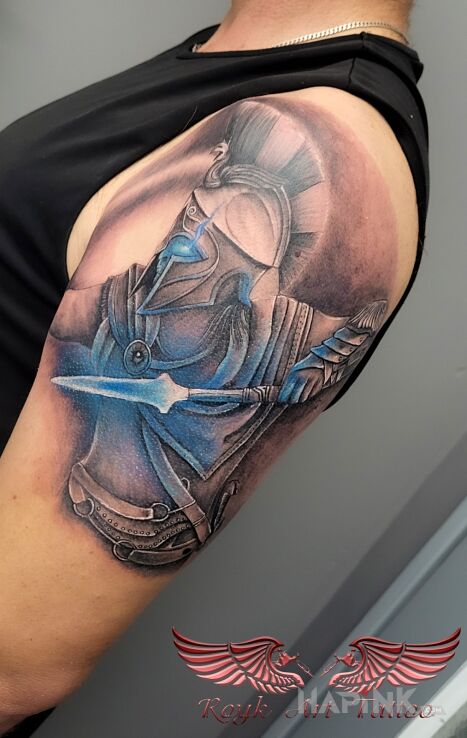 Tattoo Wojownik in characters motif and surrealistic style on the upper arm